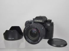 Contax N1 Camera, 24-85 Vario Sonnar Lens (nof - tested) together with instruction book.