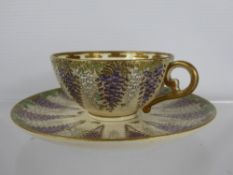 A Japanese Satsuma Wisteria Pattern Cup and Saucer, by Kinkozan.