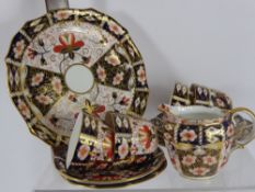 A Part Crown Derby Imari Pattern Tea Service, pattern nr 2451 comprising ,creamer, twelve cups,