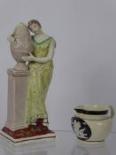 A Late 18th/early 19th Century Porcelain Figure of a Classical-style Maiden, dressed in a yellow