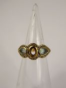 A Lady's 18 ct Yellow Gold Aquamarine and Diamond Ring, approx 40 pts of 8 cuts dias, 2 x aqua 6.4