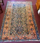 An Antique Persian Woollen Rug, of blue and salmon colouring, approx 190 x 110 cms
