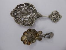A Victorian Silver Decorative Spoon, with pierced bowl depicting cherubs together with a white metal