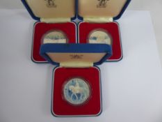 Three 1977 Royal Mint Elizabeth II Commemorative Coins, approx 84 gms with certificates and original