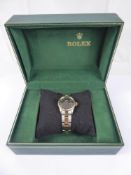 Rolex, A Lady's Oyster Perpetual Date Bracelet Watch, circa 1969. Stainless steel case with yellow