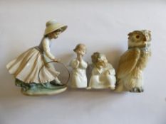 Lladro Angels, together with Nao geese and a Nao owl.