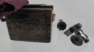 Two Vintage Service Rifle Aperture Sights, nr PH25, together with a tinted green lens nr PH7, in the