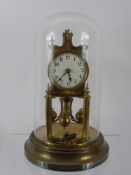 A Gustav Becker Germany Brass Anniversary Clock, nr 2484304, beneath a glass dome, the circular