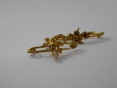 An 18 / 22 ct Baroque Pearl Brooch, the brooch in the form of vine leaf, together with another