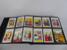 An Album containing Donald McGill Humorous Seaside and Comic Post Cards, approx 80+.