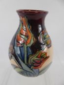 A Moorcroft Red Tulip Pattern Vase, baluster shape body, blue Moorcroft mark, WM monogram, approx 19