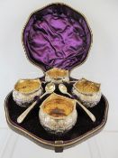 A Victorian Four Piece Silver Cruet Set, with matching spoons. London hallmark, dated 1879, mm