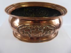 An Art Nouveau Brass Planter, depicting a heraldic shield, approx 28 x 20 cms.