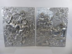 A Pair of Decorative Composite Panels, depicting cherubs, approx 38 x 48 cms.