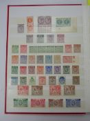 A Red Cover Stamp Stock Book, much early material and higher values noted.