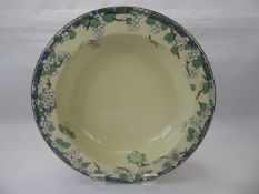 A Royal Doulton Bowl, depicting blossoms, approx 32 cms dia..