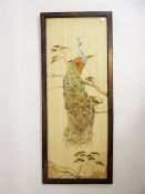 A Victorian Fine Embroidery on Moire Silk, depicting a peacock seated on a branch, framed and
