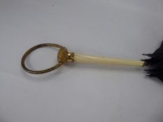 A 19th Century Ivory and Gilt Brass Parasol, approx 88 cms.