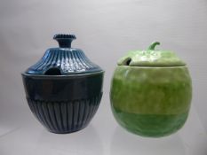 A Shelly 'Apple' Design Jam Pot, together with a Carlton Ware jam pot. (2)