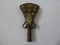 An Antique Arab Powder Flask, copper with incised brass medallion decoration, approx 23 x 13 cms