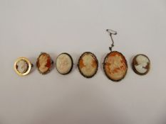 Three Silver and Marcasite Antique Shell Cameos depicting, some in profile, St George and the Dragon