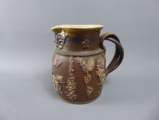 Martin Homer Studio Pottery, Brown Glazed Harvest Jug, depicting hops, flowers and figures in high