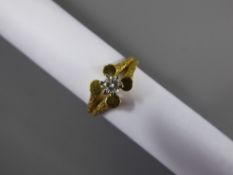 A Lady's 18 ct Yellow and Diamond Vintage Bark-Finish Ring.
