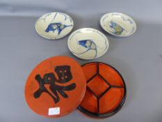 Three Chinese Ceramic Fish Plates, together with a red lacquer hors d' oeuvre tray and dishes.
