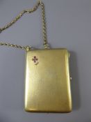 A 1920's Continental Silver, Gilt, Ruby and Diamond Writing Compact, the compact engraved 