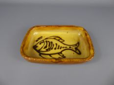 A Winchcombe Pottery Earthenware rectangular yellow-glazed dish (1940/50's), decorated with a