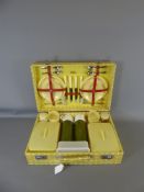 Two Vintage 1950's Picnic Sets, with one brown leather lunch box. (3)