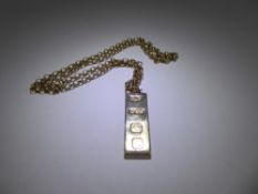 A 9 ct Gold Ingot on 9 ct Gold Chain, mm GMC, Sheffield hallmark, dated 1977, approx approx 23