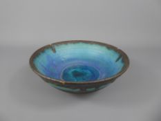 A Metallic and Turquoise Glazed Studio Pottery Vase, with potters mark to base, approx 17 x 8 cms.