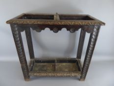 An Antique Stained Oak Umbrella Stand, with lead drip liners, approx 65 x 28 x 60 cms.