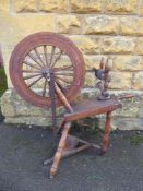 An Antique Spinning Wheel.