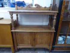 An Edwardian Oak Galleried Breakfast Buffet, approx 104 x 130 x 45 cms, with two cupboards beneath.
