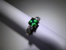 An 18 ct White Gold 2.0 ct Square Cut Vivid Emerald and Diamond Ring. The deep green emerald