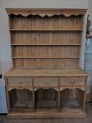 A Vintage Pine Dresser with three plate shelves to top and three drawers to bottom above three