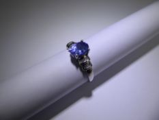 A 9ct White Gold Tanzanite and Diamond Ring,