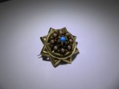 An Edwardian 14-15 ct Yellow Gold (tested), Diamond, Turquoise and Seed Pearl Star Brooch,