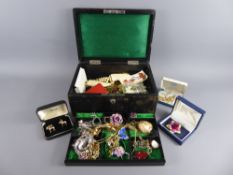 A Victorian Leather Jewellery Box, with contents, including necklaces, bracelets, rings, earrings,