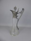 An Art Nouveau Wurttembergische Metallwarenfabrik Pewter and Glass Claret Jug, approx 38 cms high.