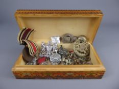 A Tin Containing a Police Medal to 