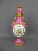 A Late 19th Century Vienna Porcelain Bottle Vase and Cover, hand painted with floral spray and