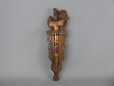 An Indonesian Kris Sword in Wooden Holder.