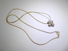 A 9ct Gold and Diamond Cross Pendant by Brook & Bentley with original certificate, total approx wt