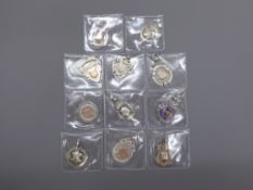 Collection of Eleven Silver and Silver Gilt Fob-Shields.