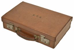A delightful miniature tan leather travelling document case 20th century the lid opening up to