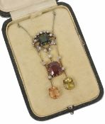 An attractive and unusual belle ?poque diamond and gem set scroll pendant necklace the centre set