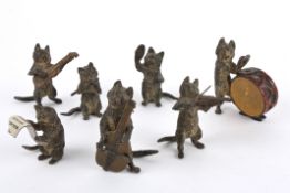An Austrian cold painted bronze Cat Band, 20th century the seven cat figures each playing a